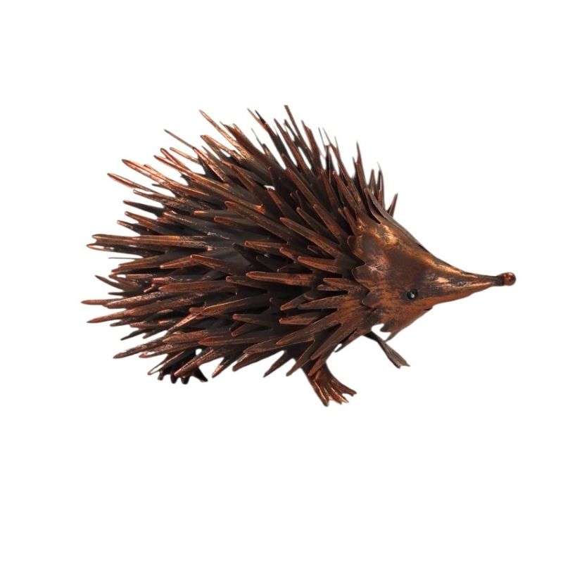 A realistic brown hedgehog figurine with spiky quills, shown from the side on a plain white background.