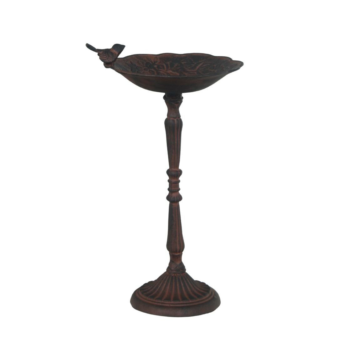 Decorative metal bird bath with a stand on a white background