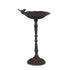 Decorative metal bird bath with a stand on a white background