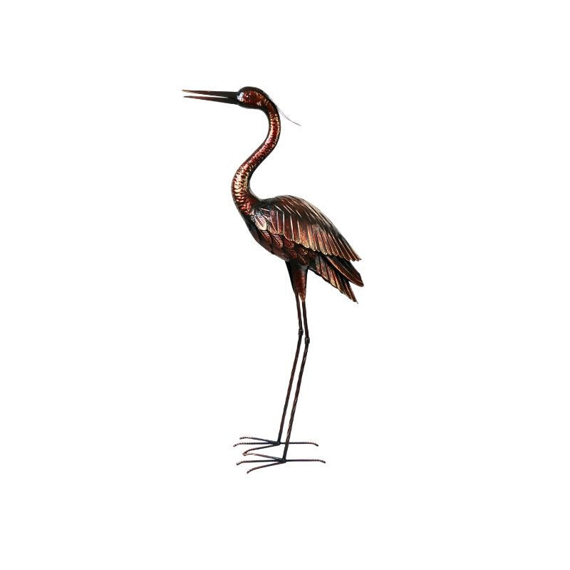 Bronze-colored metal crane sculpture on a white background