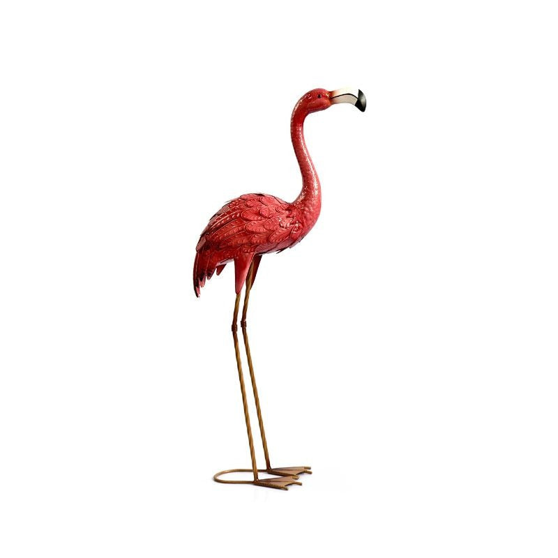 Decorative pink flamingo statue on a white background