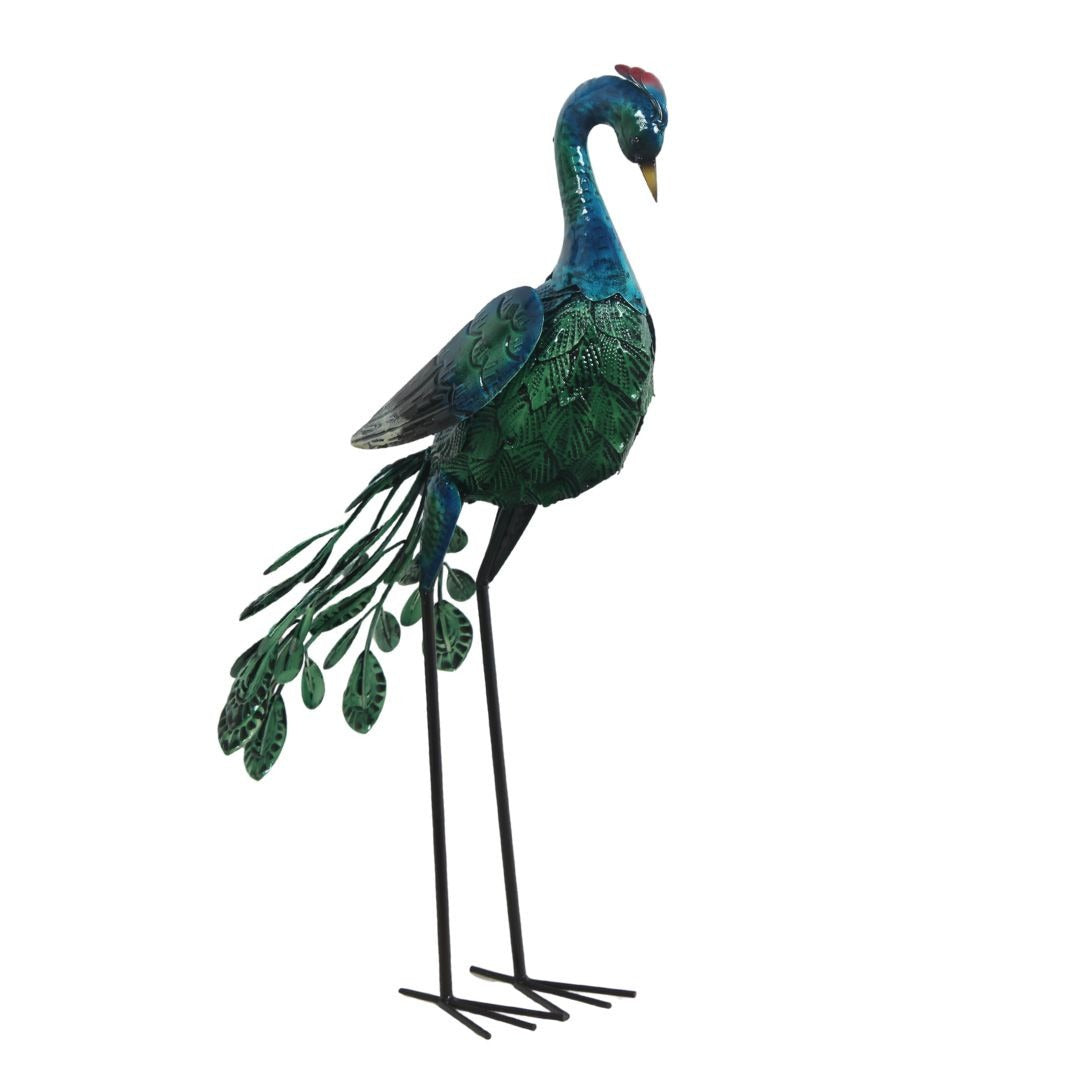 Decorative peacock statue on a white background